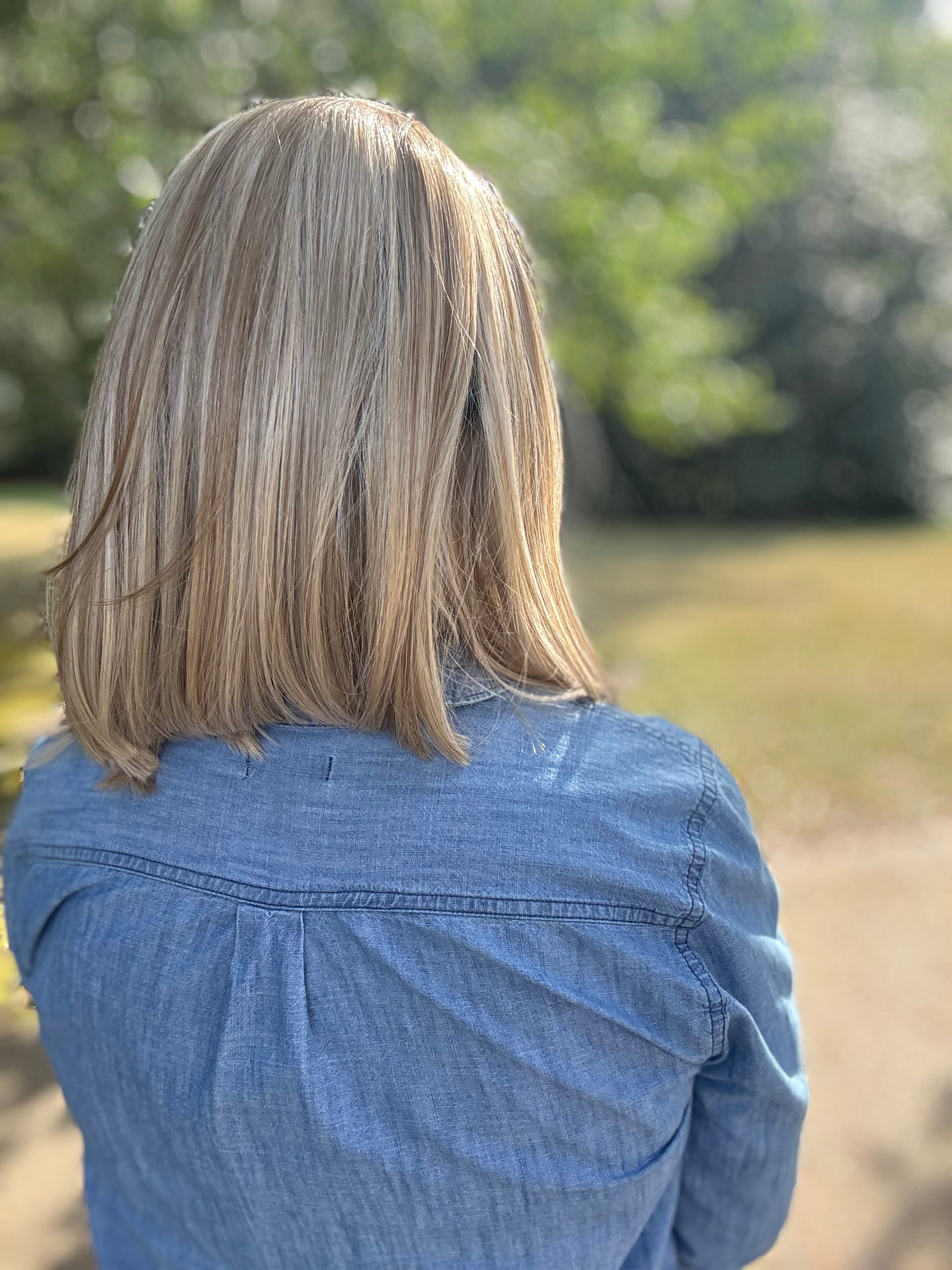 Edie rooted blonde